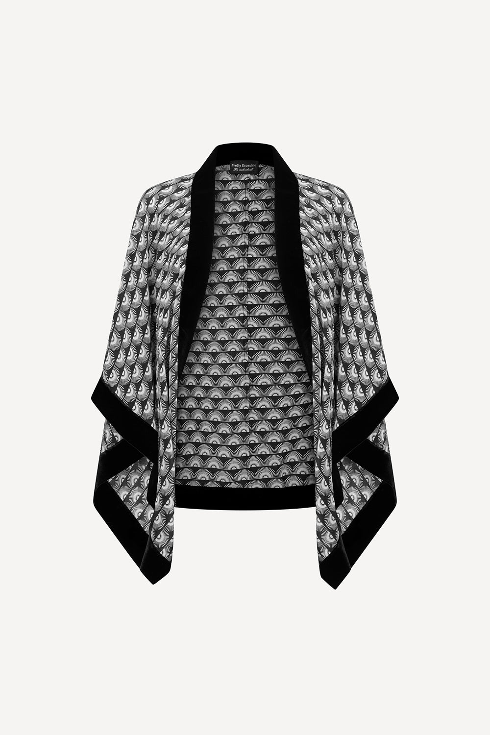 Black and white patterned kimono-style shrug on a white background