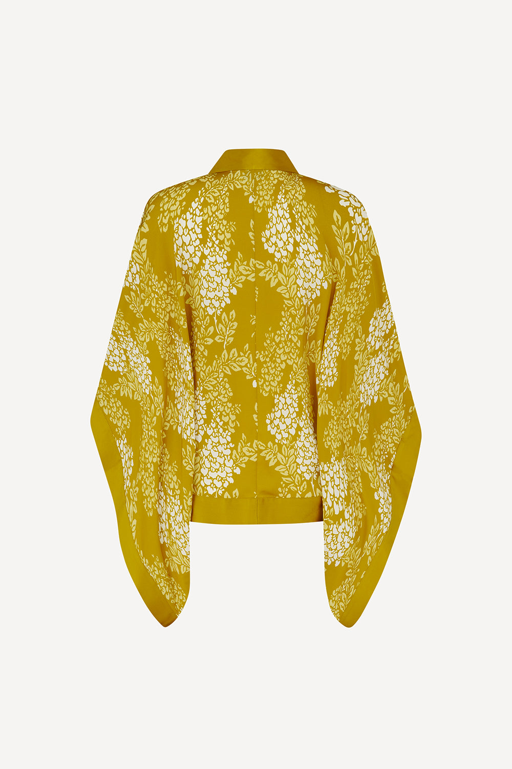 The back view of a yellow kimono-style cardigan with wide sleeves and a white floral pattern, displayed flat against a light grey background.