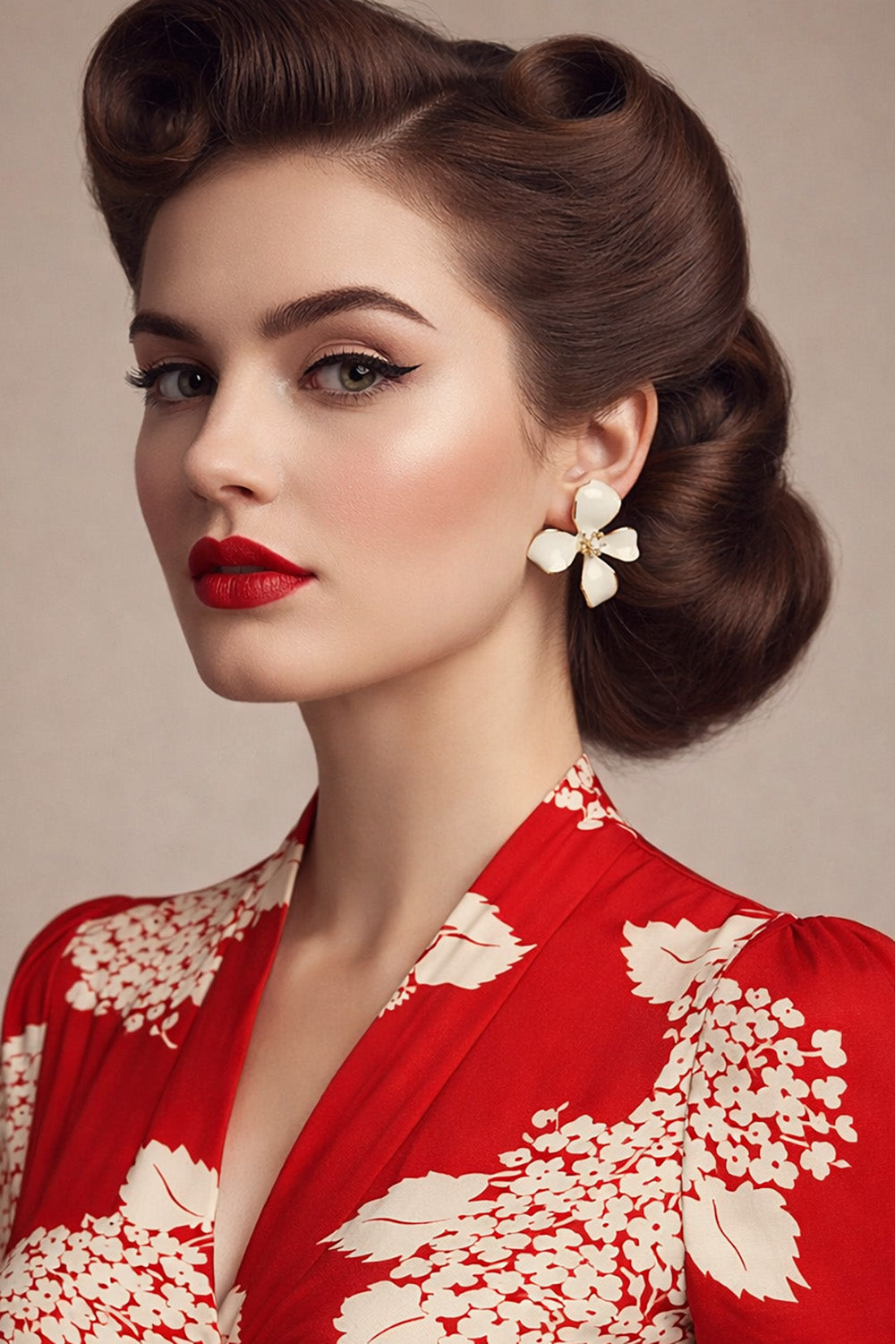 Woman with vintage hairstyle wearing flower earrings and a red dress with floral patterns