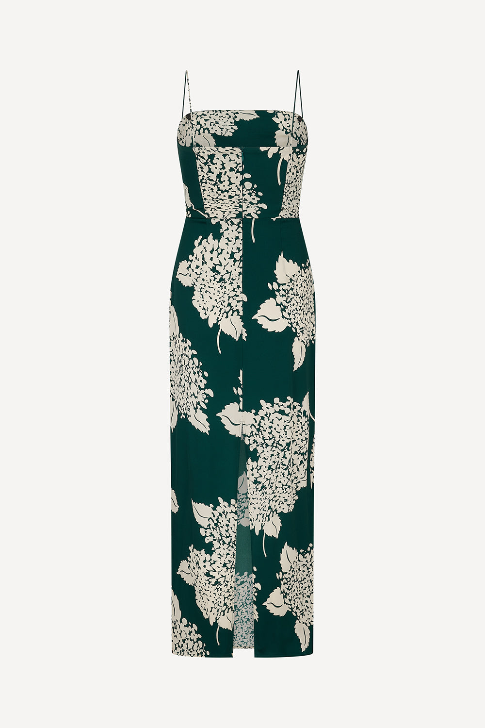 The back of a silk dark green sleeveless maxi dress with a white floral print and thin spaghetti straps, shown against a plain light grey background.
