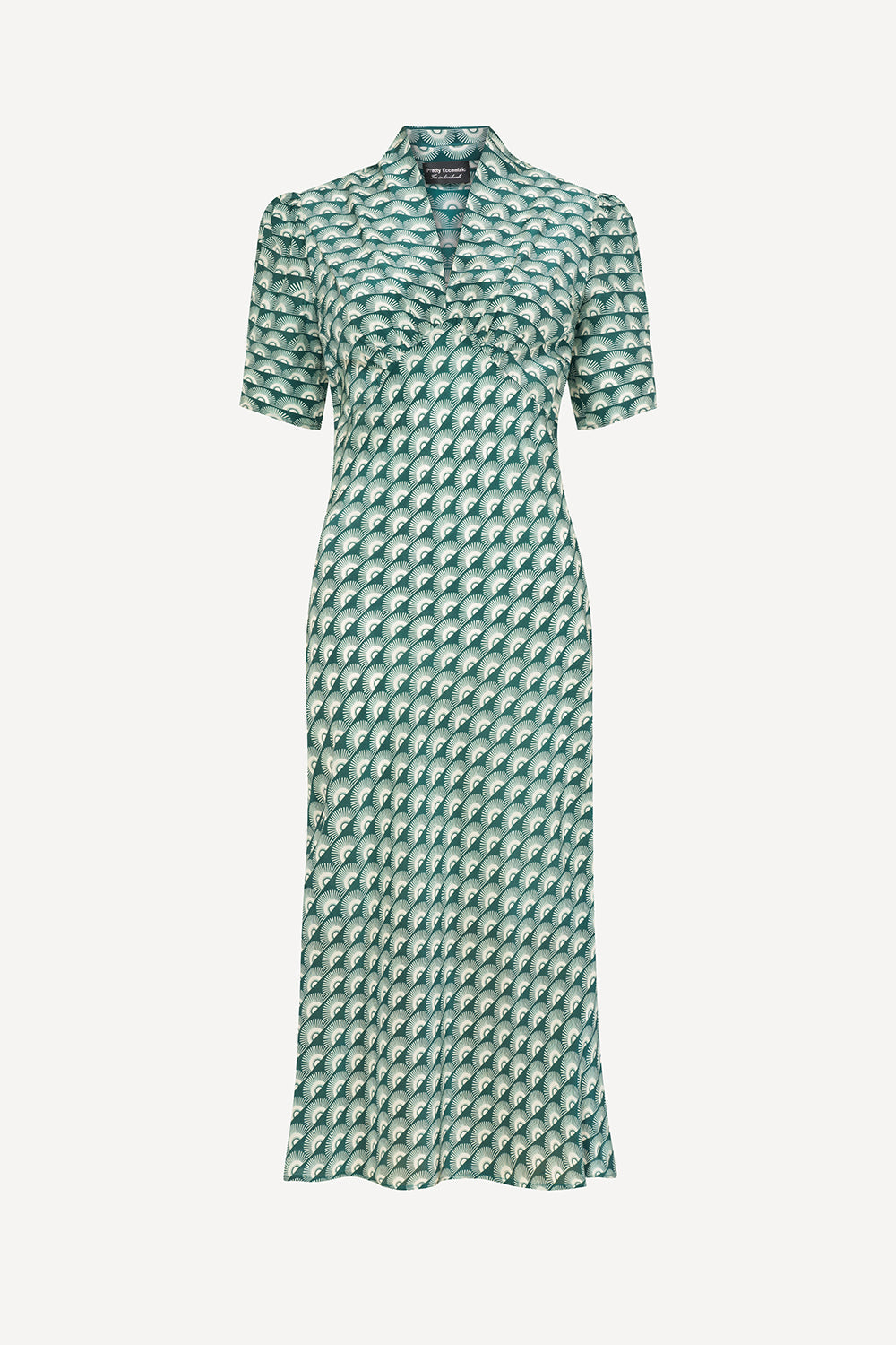 A midi dress with a short-sleeved design, featuring a geometric pattern in teal and white colors.
