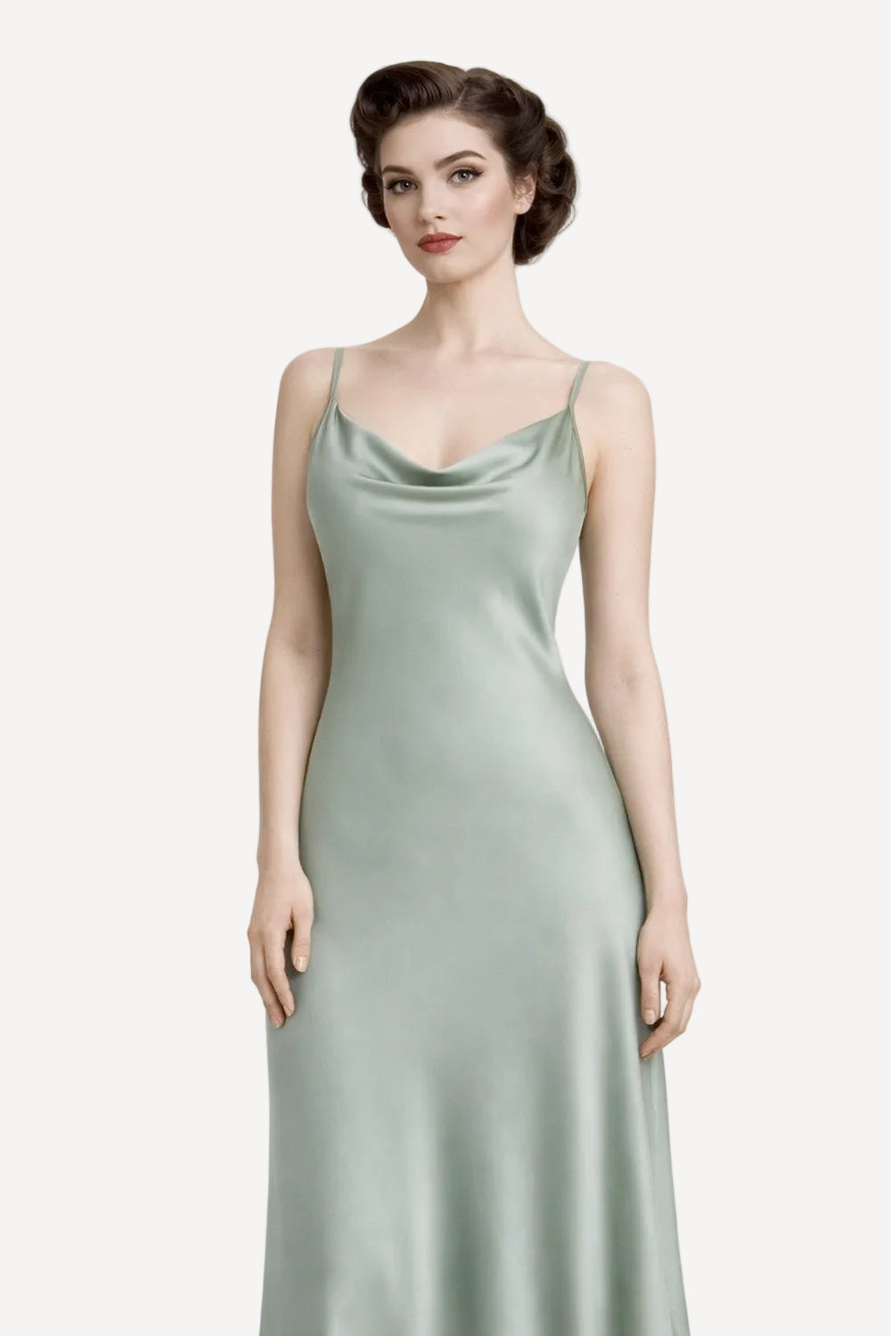 Model wearing sage green satin slip dress