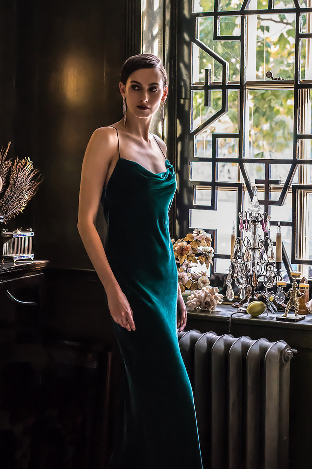 Model wearing green flapper dress