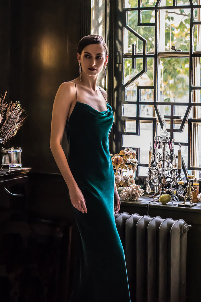 Model wearing green flapper dress