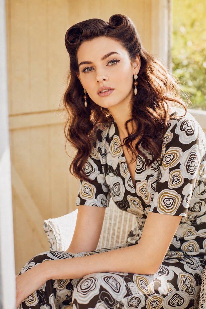 Female model wearing a Bloombury Set inspired print dress