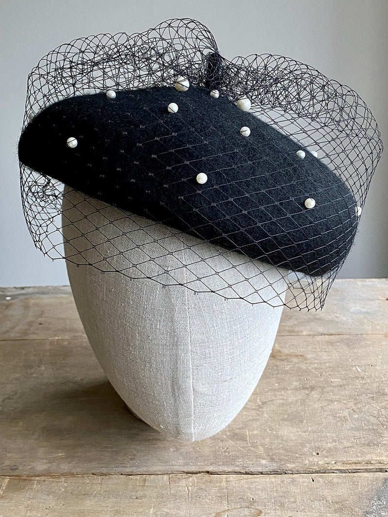 Veiled black beret with ivory pearls