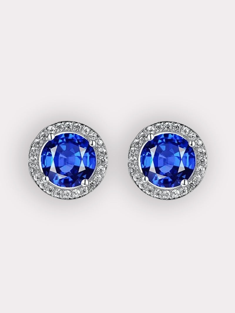 Round halo stud earrings in sapphire blue