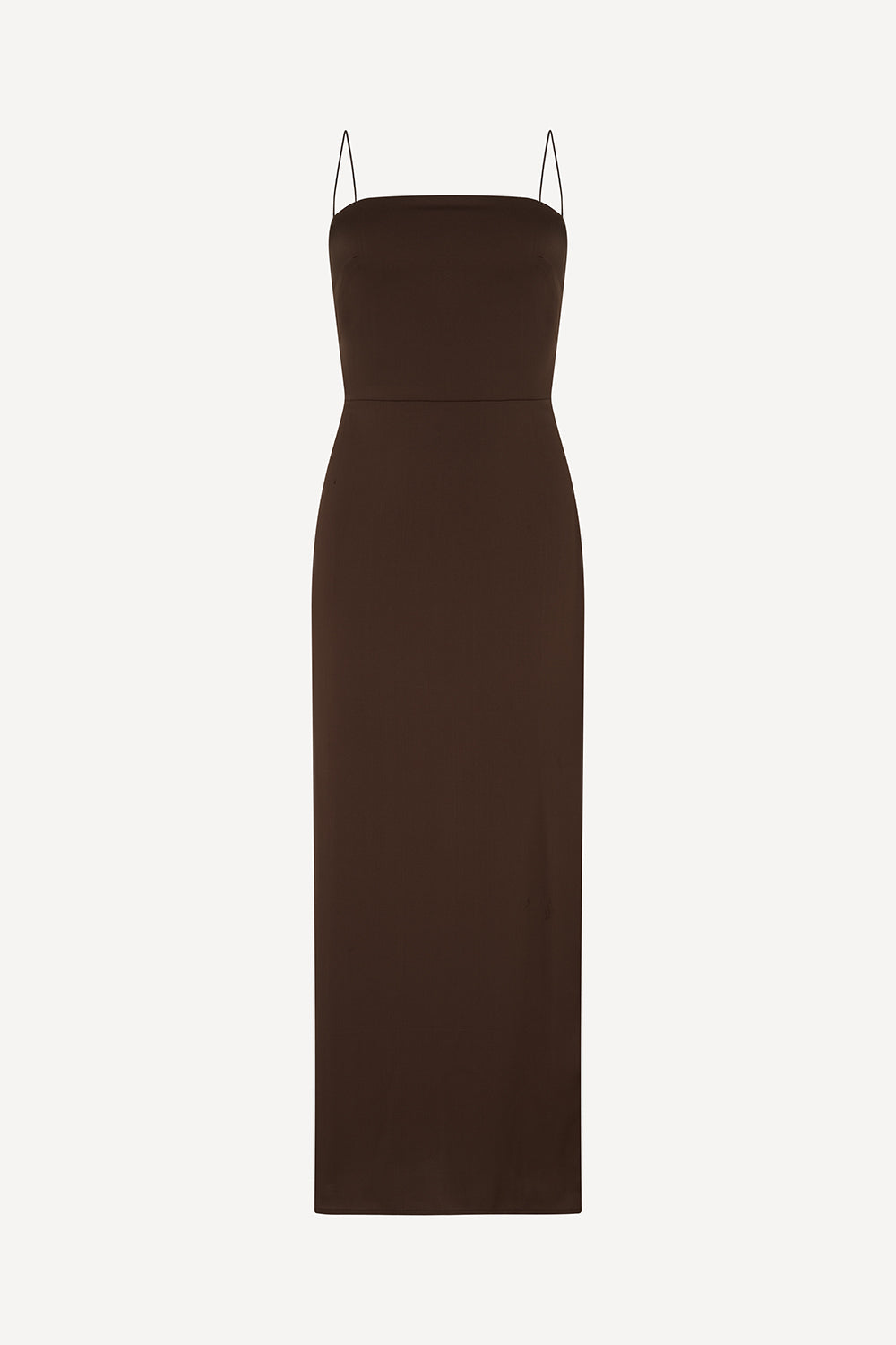 Brown maxi slip dress will straight neckline and spaghetti straps on a pale grey background