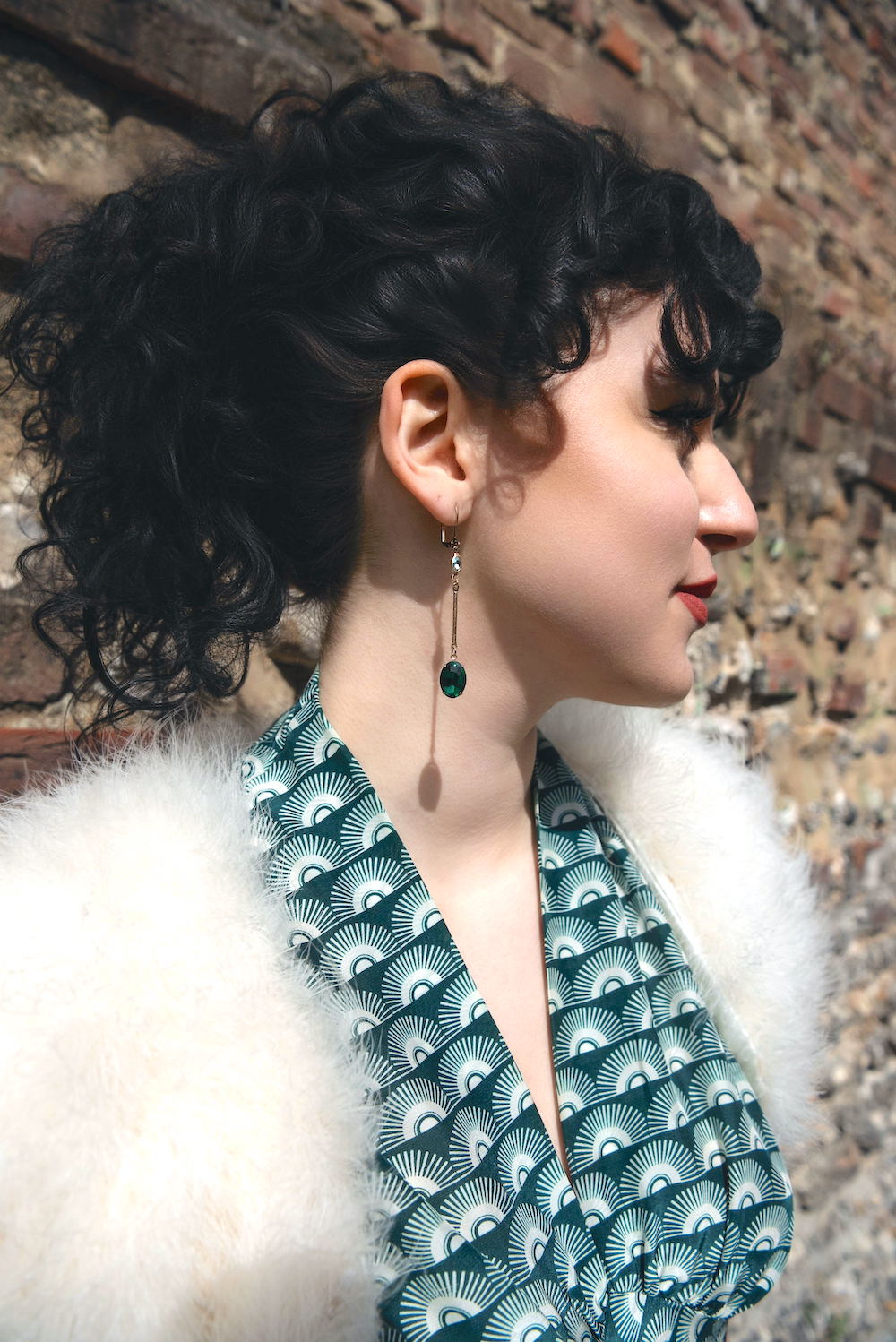 Long drop earrings in emerald green