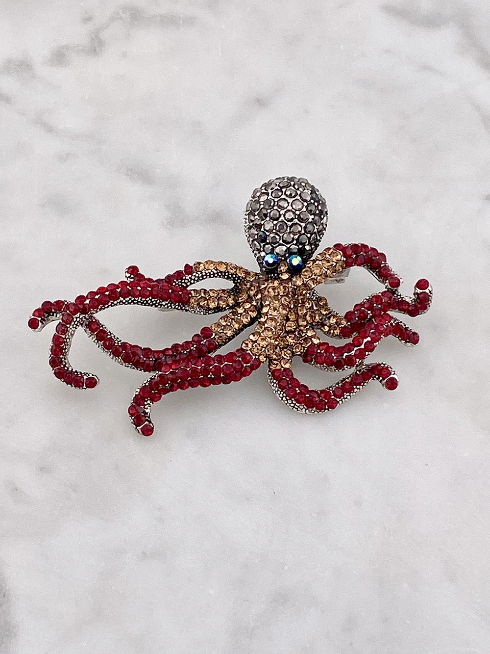 Octopus brooch in bronze