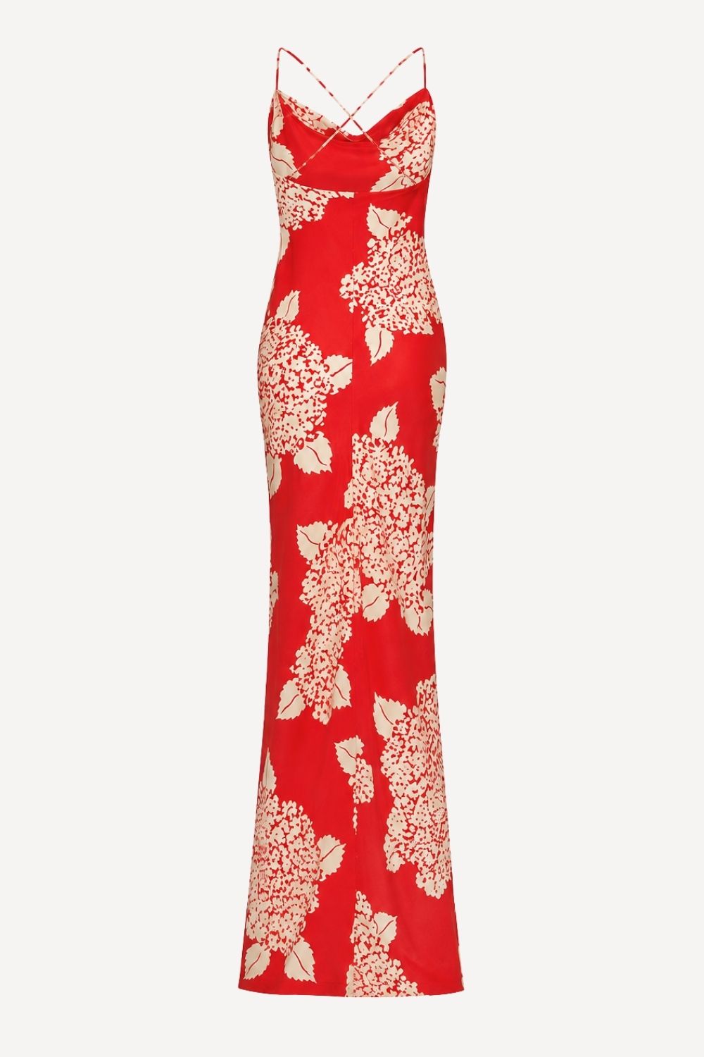 A red floor-length slip dress with a cream floral print and thin crisscross shoulder straps, shown against a plain light gray background.