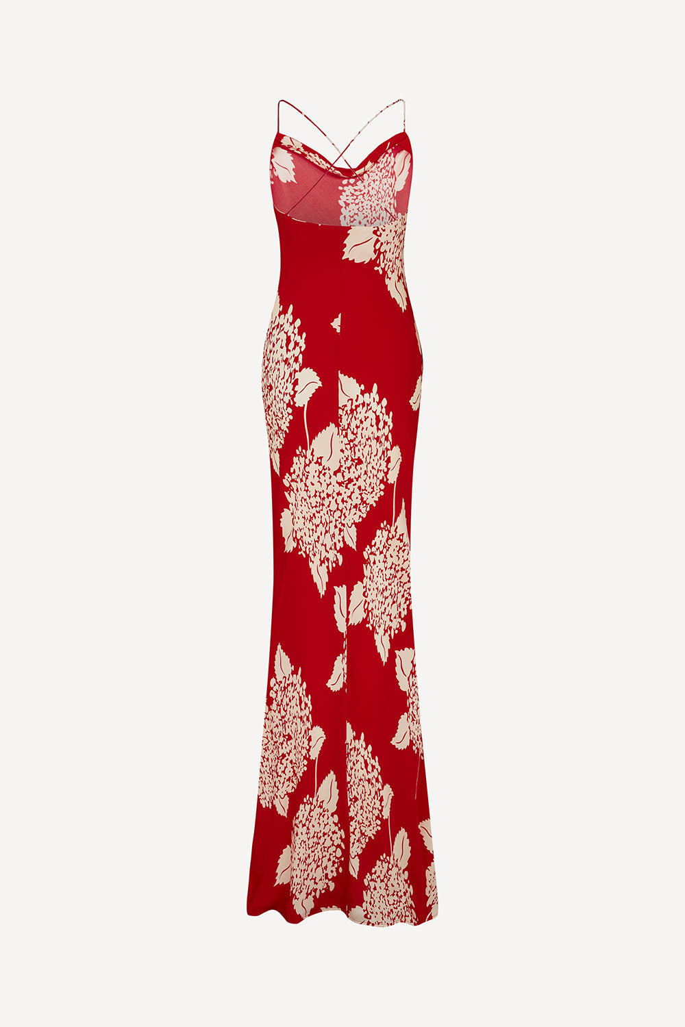 The back of a red silk floor-length spaghetti-strap dress with a cream floral and leaf print, featuring a sheer mesh V-neckline detail, shown against a plain light grey background.