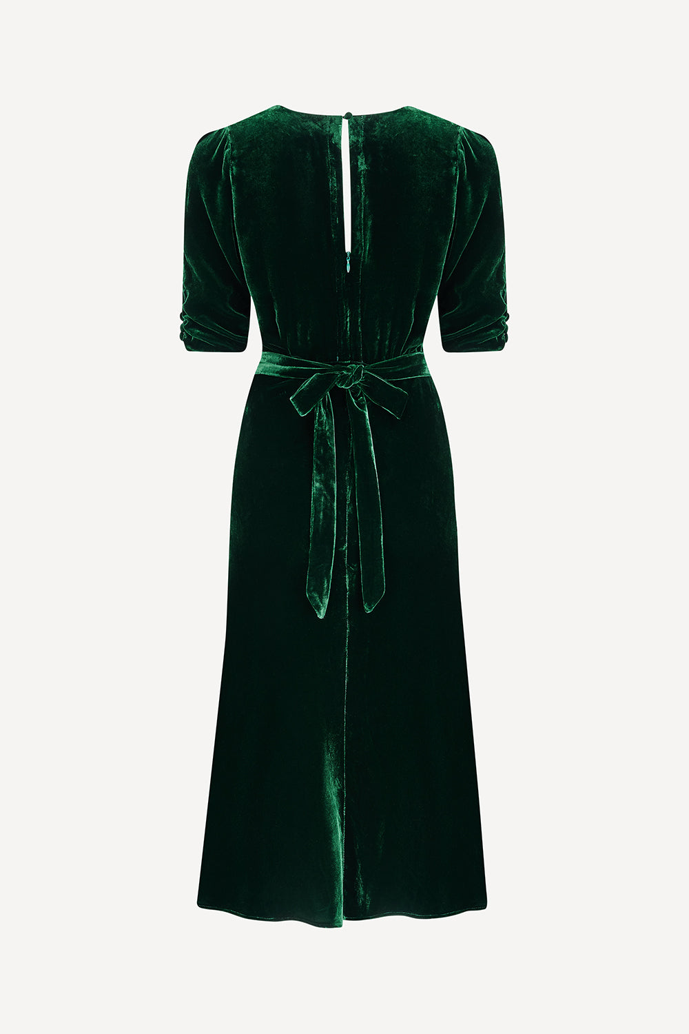 Green velvet dress with a belt on a white background