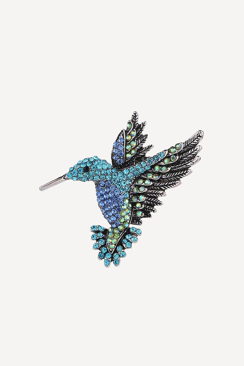 Blue humming bird brooch