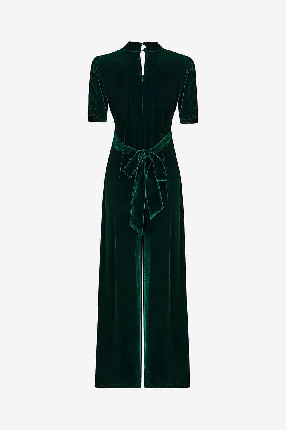 Green velvet jumpsuit with a belt on a white background