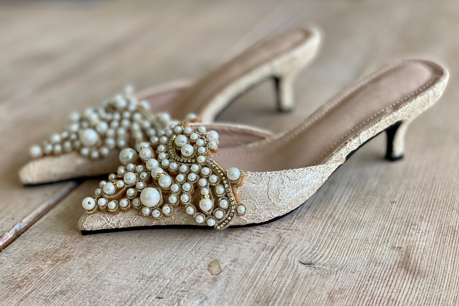Pearl kitten heel mules in ivory